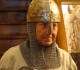Jean essayant une nouvelle tenue de protection (casque et cotte de maille) pour ... escalade dans le Saussois